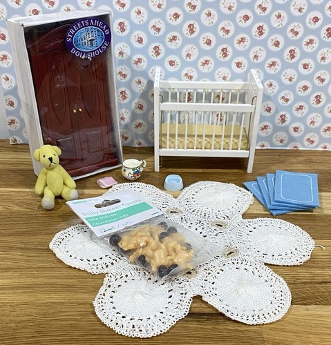 Dolls house babies cot - babies,